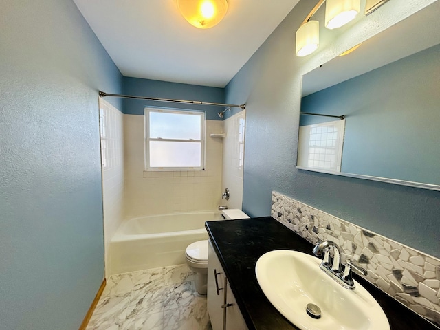 full bathroom with toilet, decorative backsplash, vanity, and tiled shower / bath combo