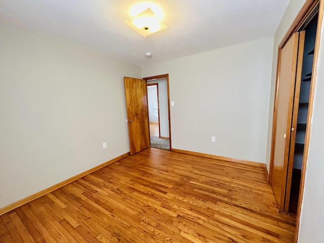 empty room featuring light hardwood / wood-style floors