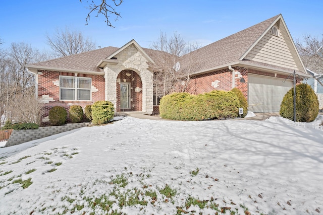 view of front of property featuring a garage