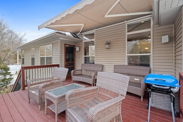 wooden deck featuring an outdoor hangout area and area for grilling