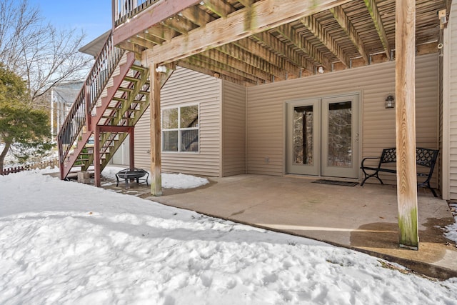 view of snow covered patio