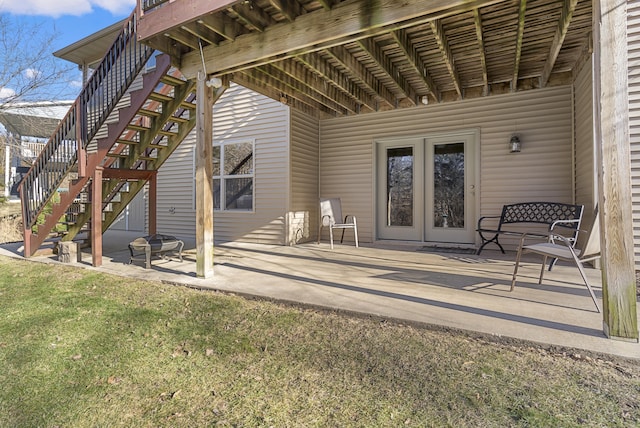 view of patio featuring stairway