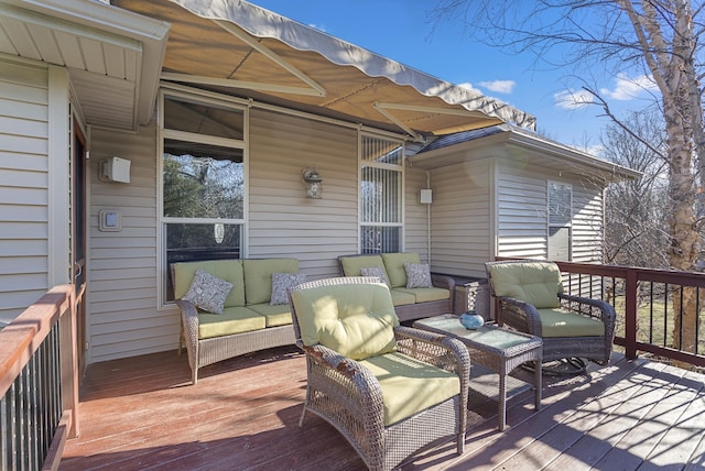 wooden terrace featuring outdoor lounge area