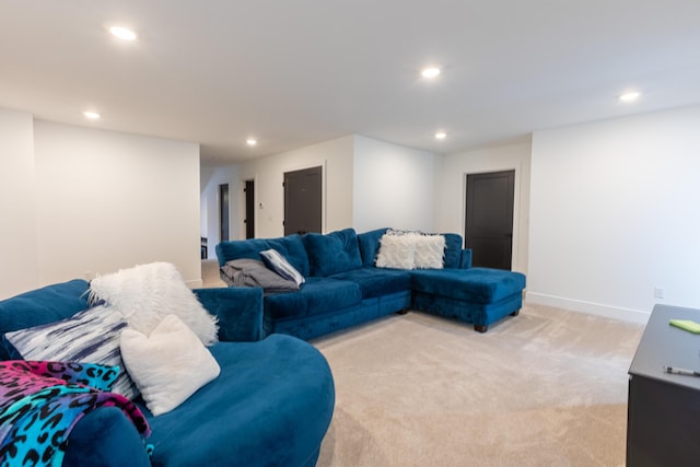 living room featuring light carpet