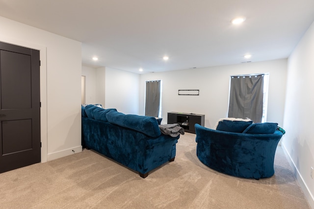 living room with light colored carpet