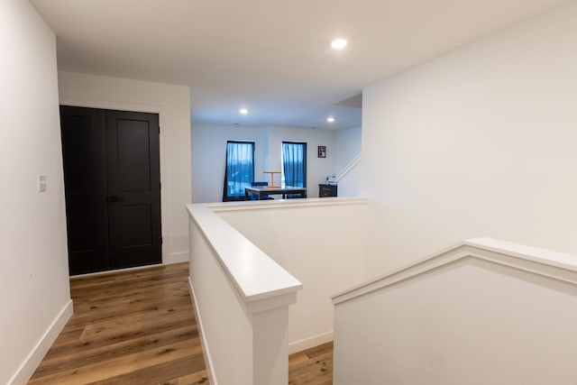 hallway featuring hardwood / wood-style floors