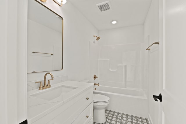 full bathroom featuring tub / shower combination, toilet, and vanity