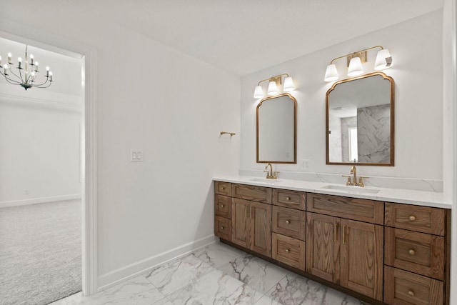 bathroom featuring vanity and an inviting chandelier