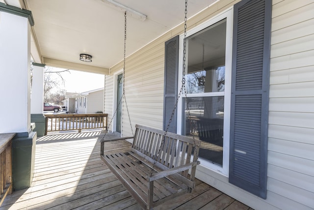 wooden deck featuring a porch