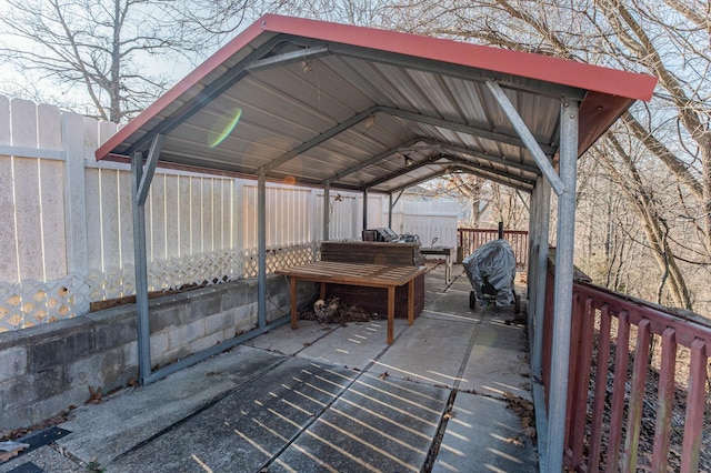 view of patio featuring a carport