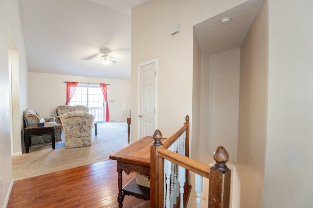 hall with hardwood / wood-style flooring