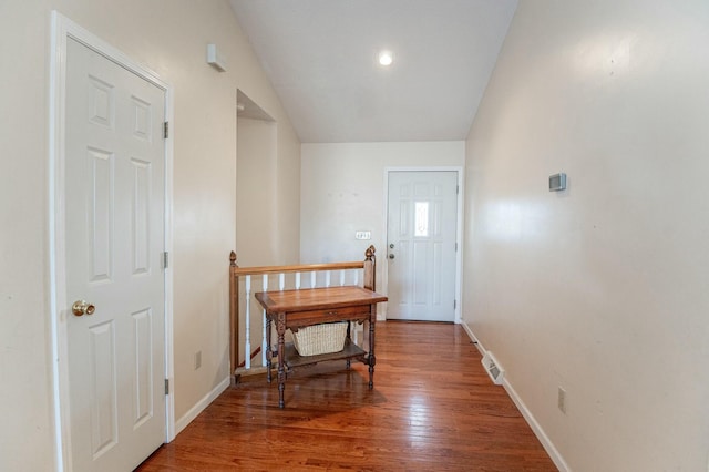 doorway to outside featuring wood-type flooring