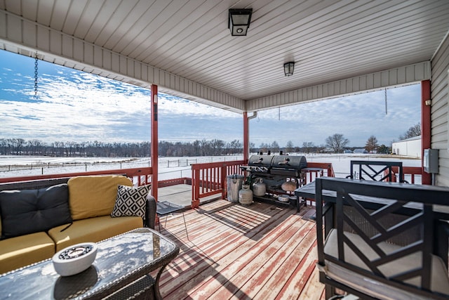 view of snow covered deck