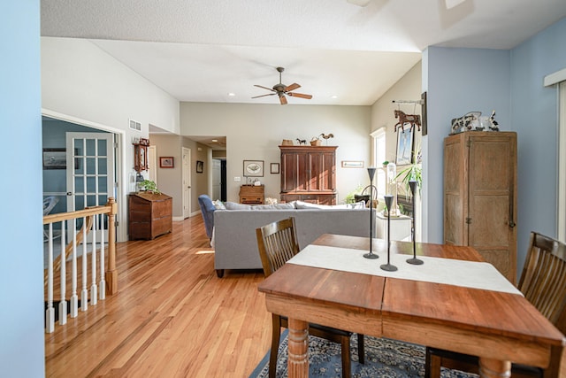 dining space featuring ceiling fan and light hardwood / wood-style floors