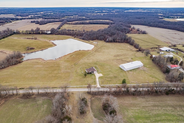 drone / aerial view featuring a rural view and a water view