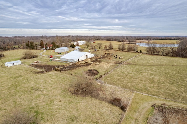 bird's eye view featuring a rural view and a water view