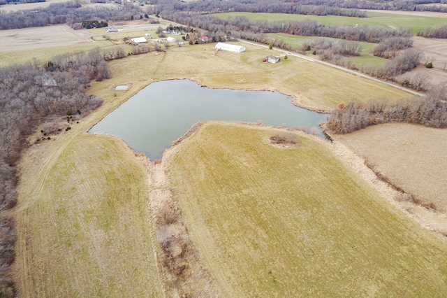 bird's eye view featuring a water view and a rural view