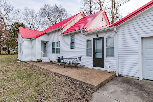 rear view of property with a patio