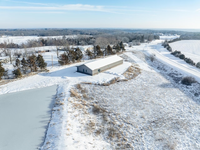 snowy aerial view with a rural view