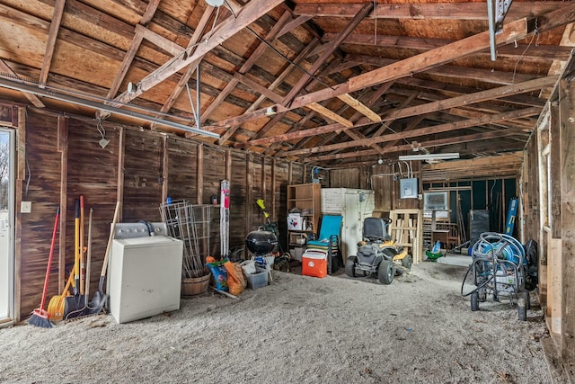 misc room with lofted ceiling and washer / clothes dryer