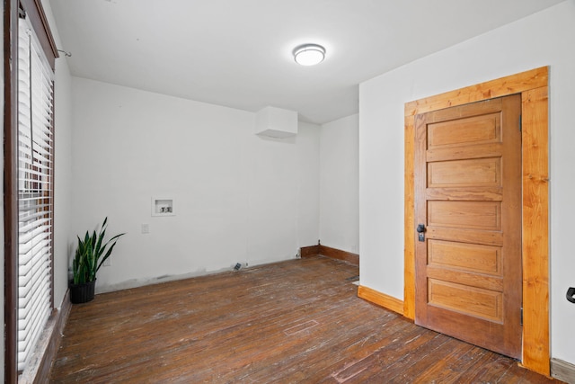 unfurnished room featuring dark hardwood / wood-style flooring