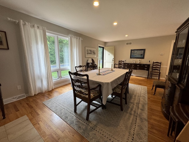 dining room with light hardwood / wood-style floors