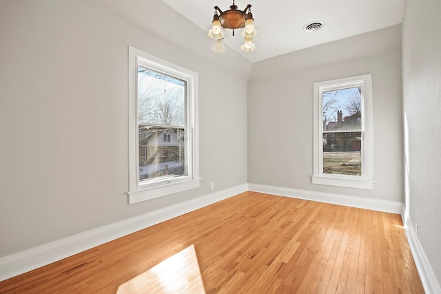 empty room with wood-type flooring