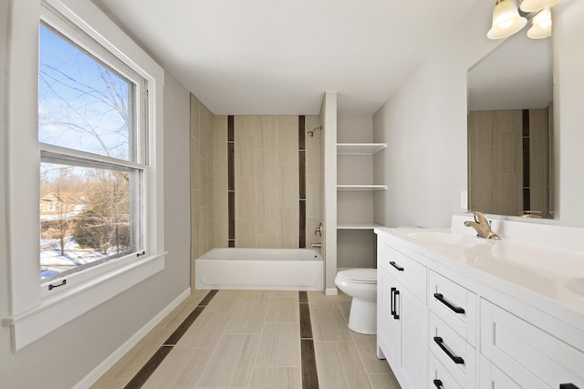 full bathroom featuring shower / bathtub combination, vanity, and toilet