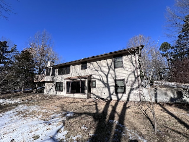 view of snow covered house