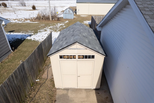 view of snow covered garage