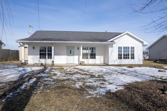 view of snow covered house