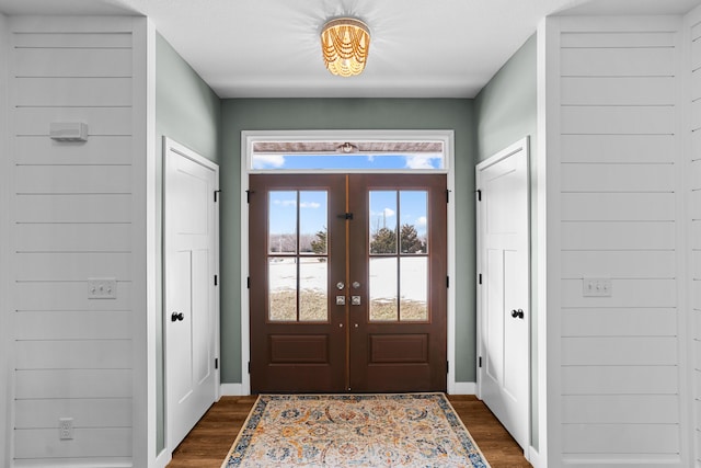 doorway featuring french doors and dark hardwood / wood-style floors