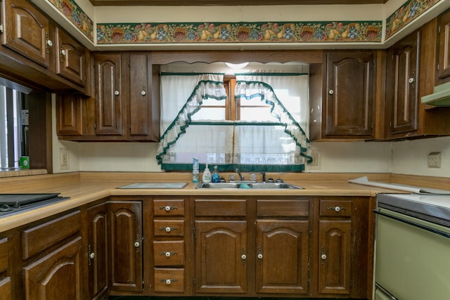 kitchen with sink and range