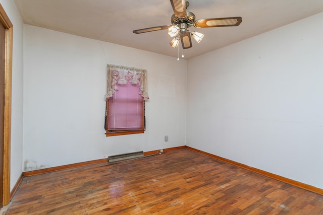 empty room featuring wood-type flooring and ceiling fan