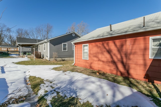 view of snow covered property