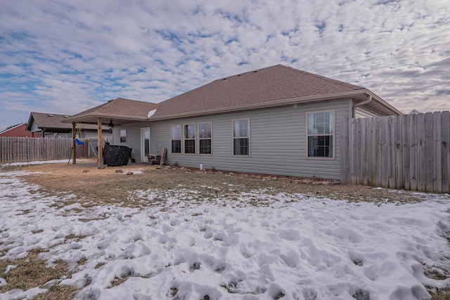 view of snow covered house