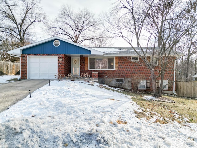 view of front of property featuring a garage