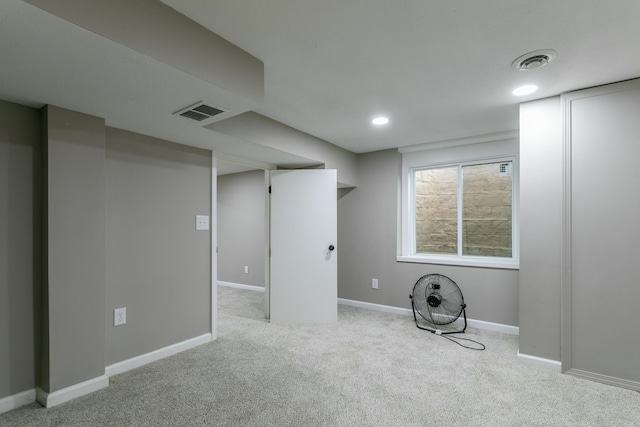 basement with light carpet