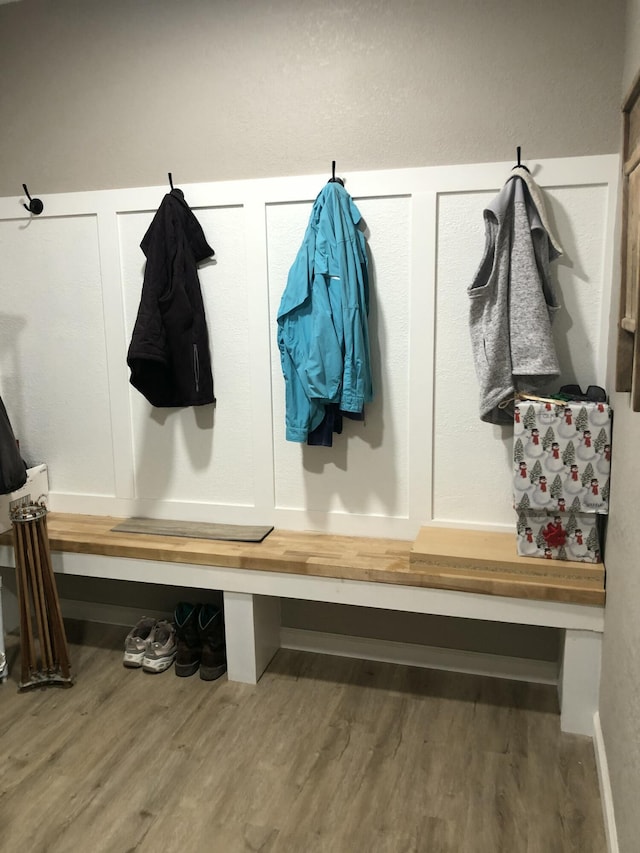 mudroom with hardwood / wood-style floors