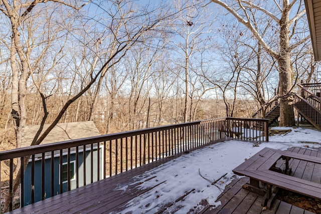 view of snow covered deck