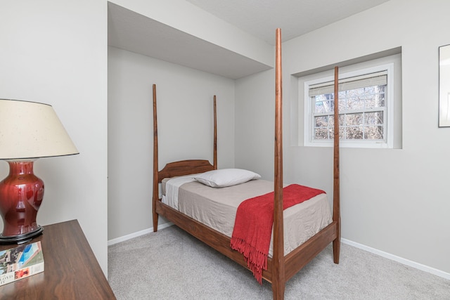 bedroom with light carpet