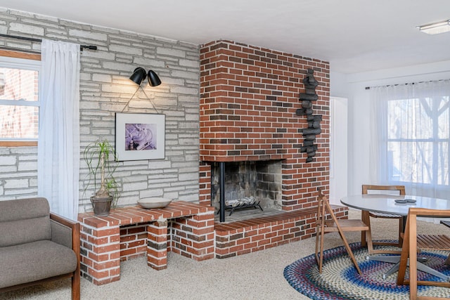 living room featuring a fireplace