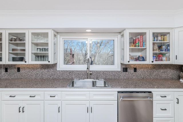 kitchen with sink, crown molding, stainless steel dishwasher, and white cabinets