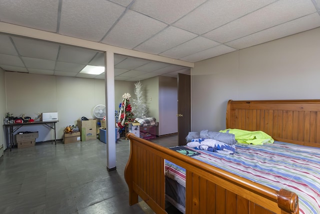 bedroom featuring a paneled ceiling