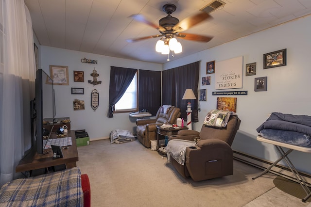 sitting room featuring carpet flooring and ceiling fan