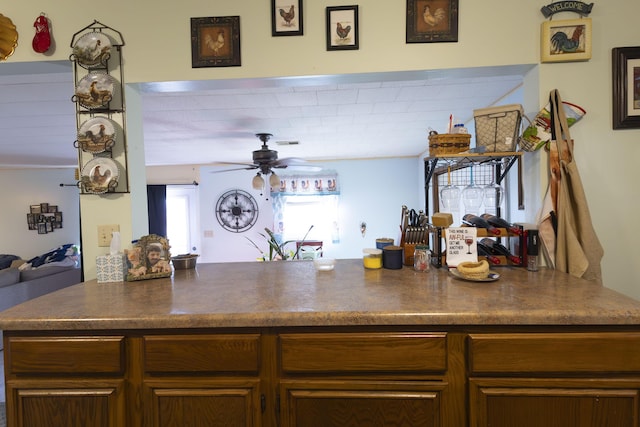 kitchen featuring ceiling fan