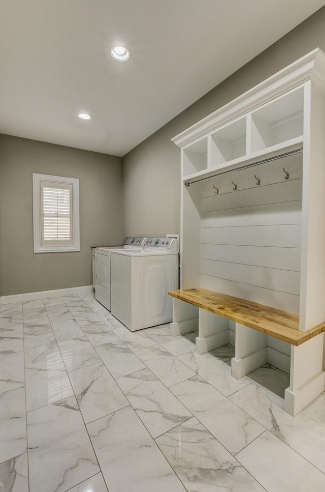 laundry area with separate washer and dryer