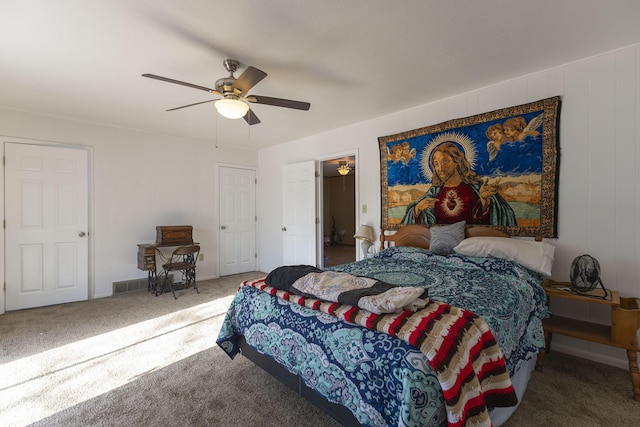 bedroom with ceiling fan and carpet floors