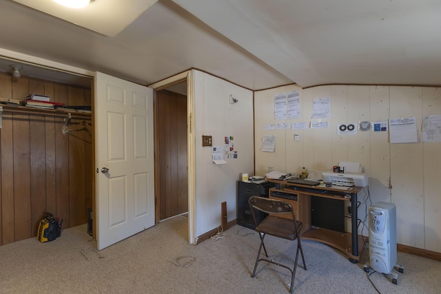 carpeted office with wooden walls