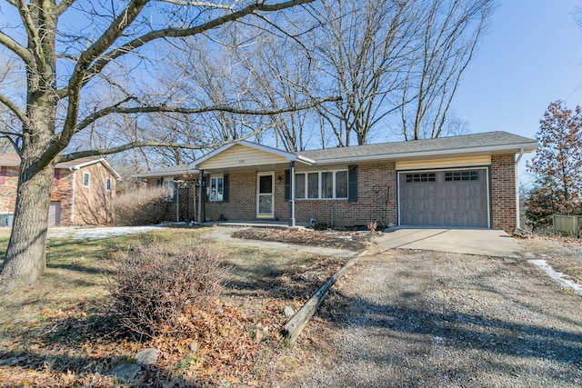 ranch-style house featuring a garage